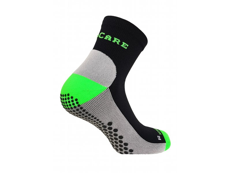 Grön/svarta sportstrumpor med kompression