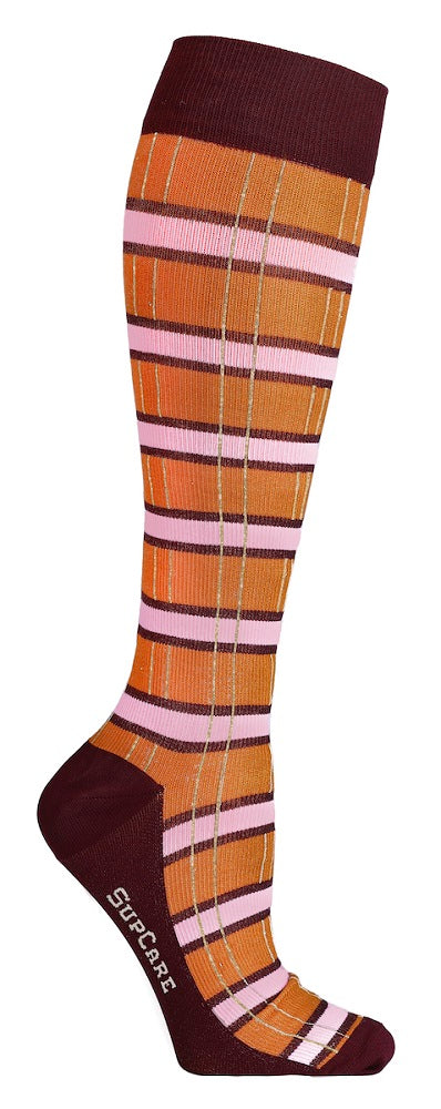 Stödstrumpor med mönster i orange/rosa/röd och guldglitter