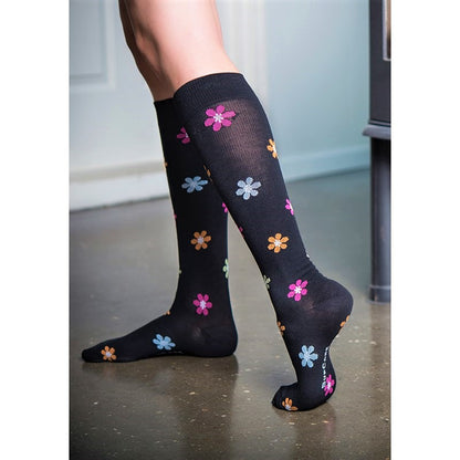 Mörka stödstrumpor med blommor