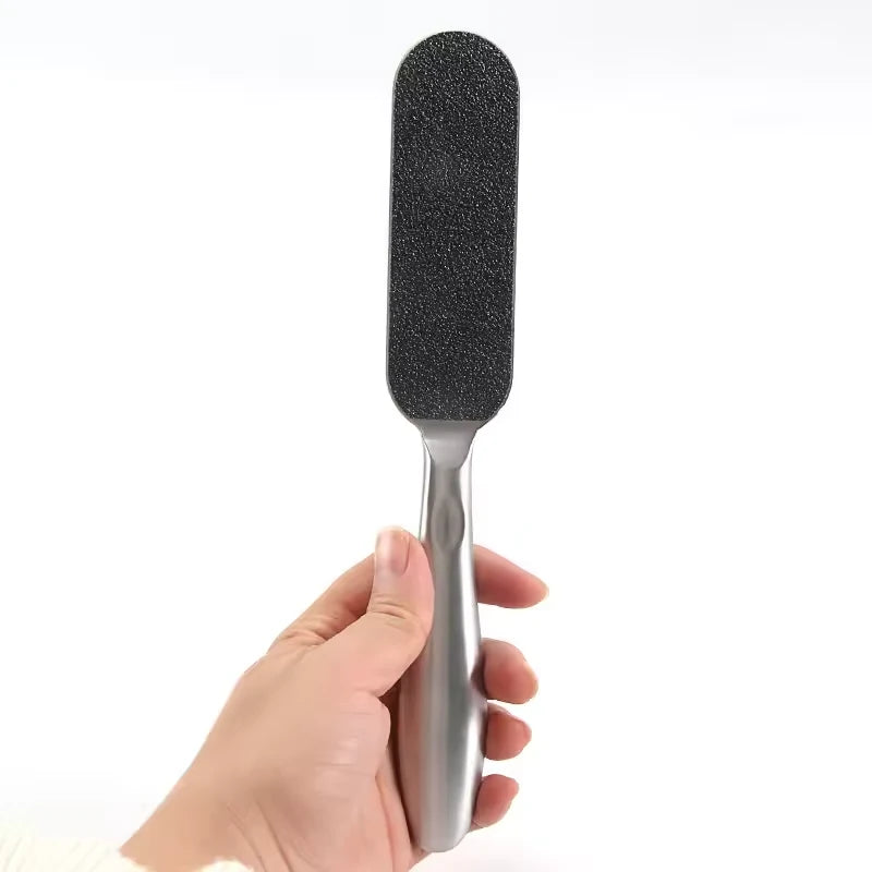 Fotfil i metall med två slipytor och 10 extra blad