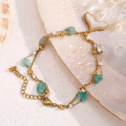 Fotlänk med dubbel kedja, pärlor och berlock