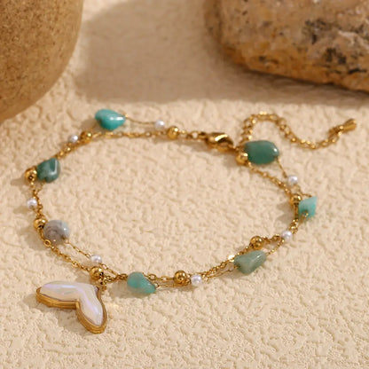 Fotlänk med dubbel kedja, pärlor och berlock